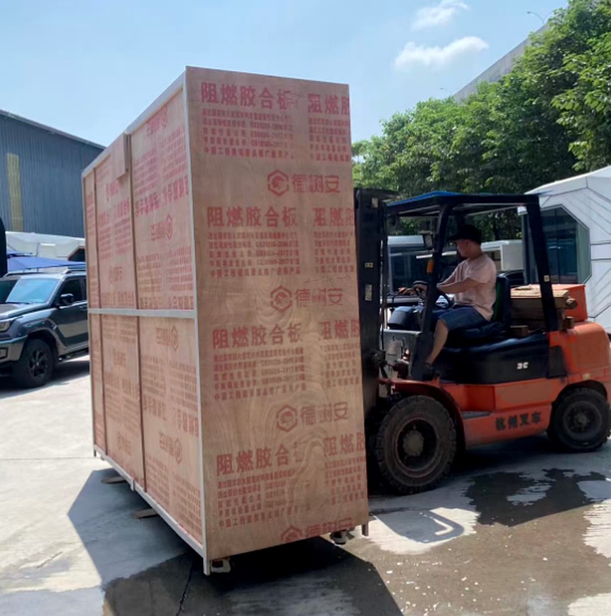 Wooden case packed outdoor kitchen module moved by forklift